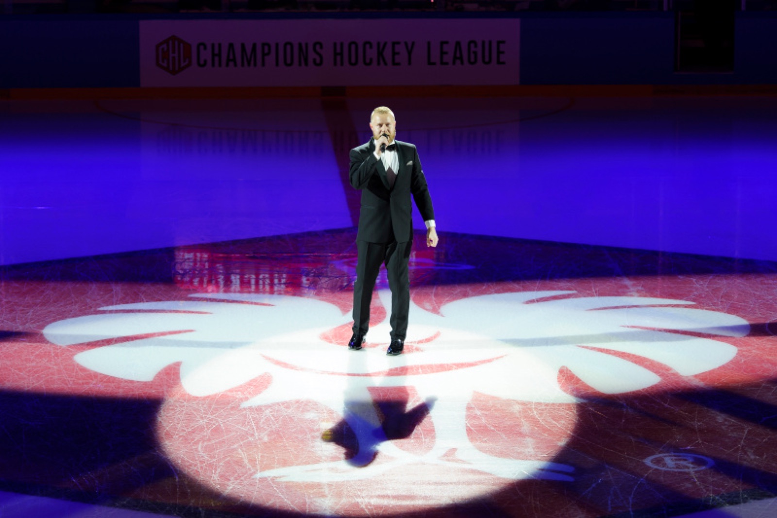 Lauri hosting a Champions Hockey League event in an ice arena